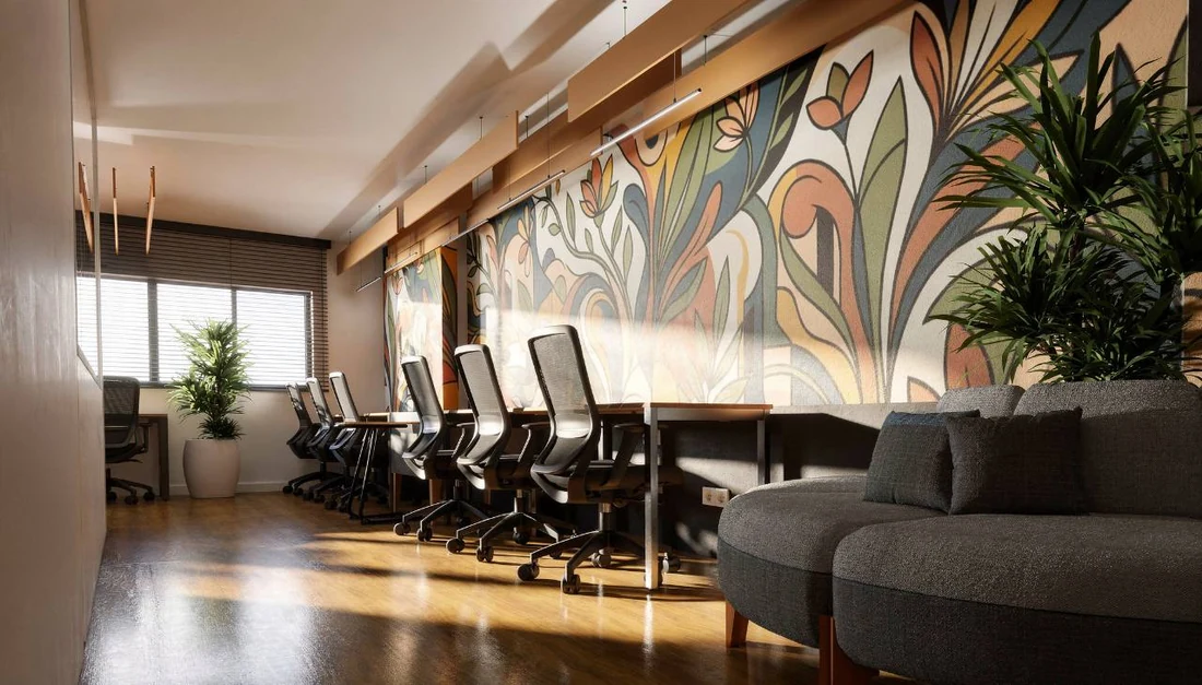 Ambiente de trabalho projetado pelo estúdio com mural botânico e luz natural
